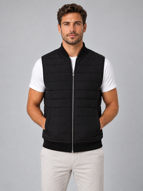 Men's black quilted bodywarmer, front studio view