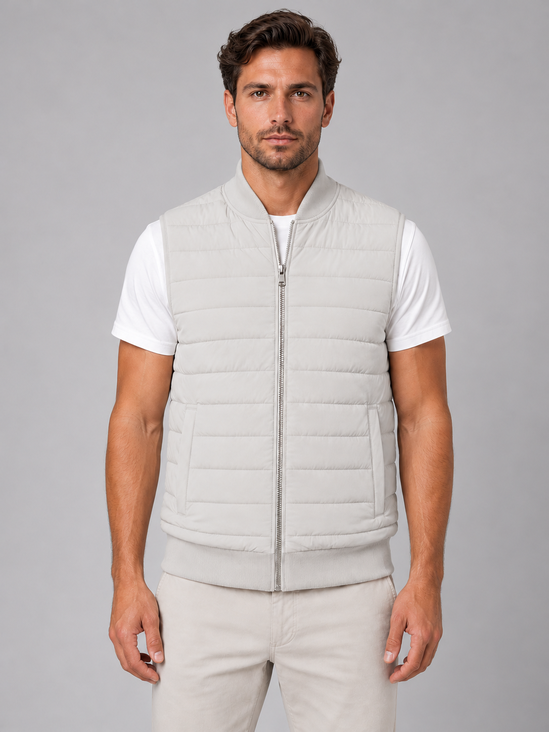 Men's light-grey quilted bodywarmer, front studio view