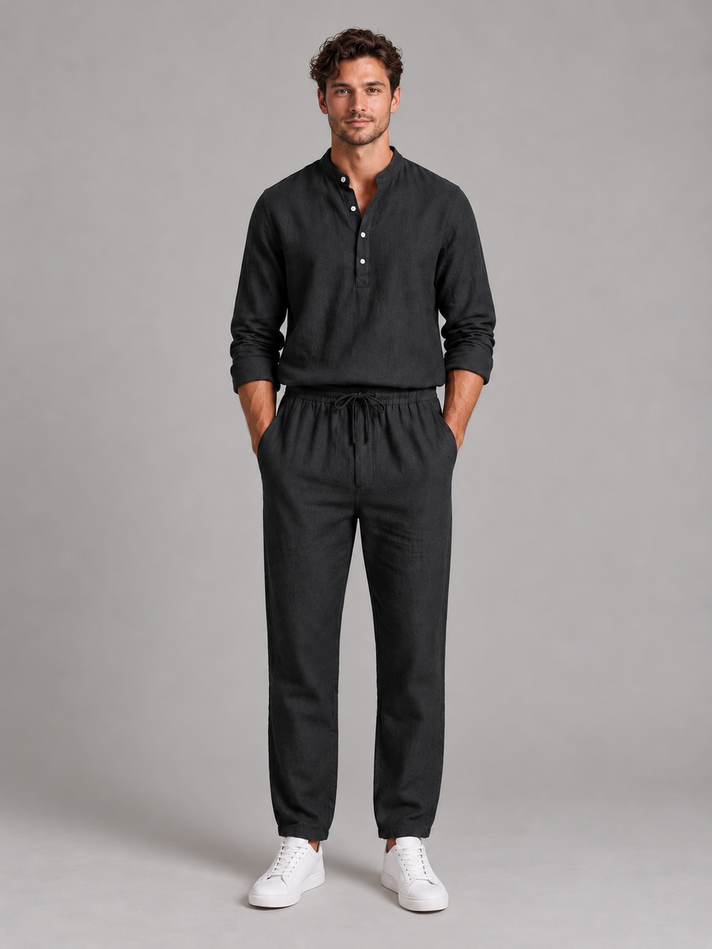 Men's black linen-look shirt and trousers set, front studio view