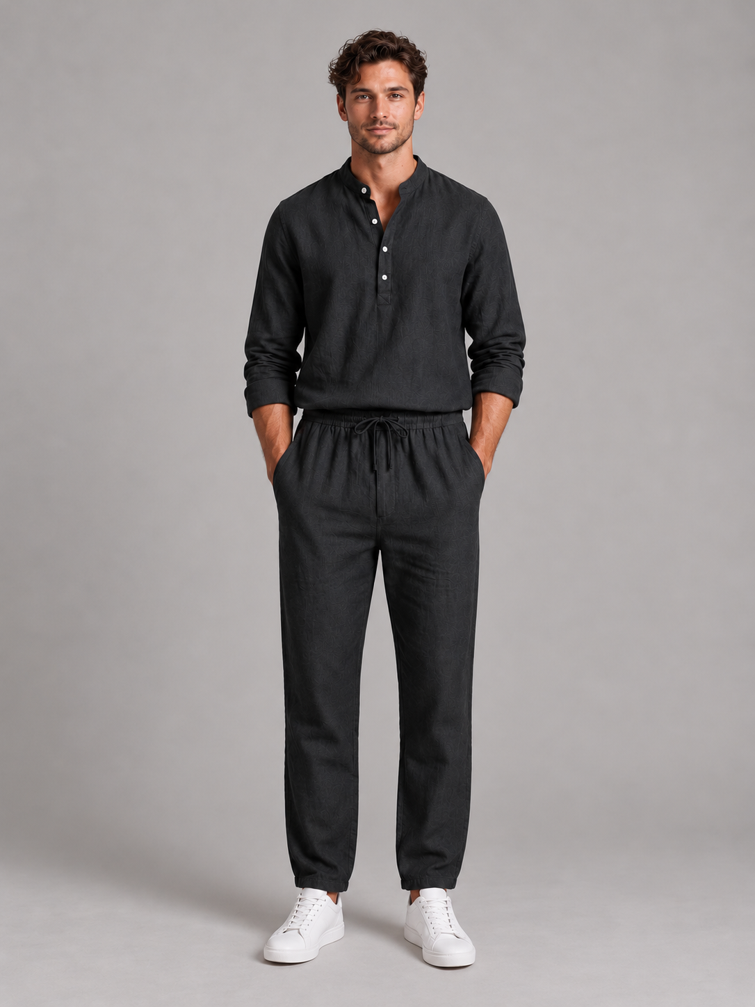 Men's black linen-look shirt and trousers set, front studio view