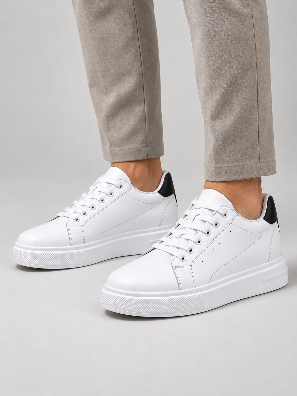 Men's Leather Trainers – Low Top Lace Up Casual Sneakers — model-worn studio view